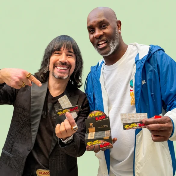 Image of CEO Josh Kesselman and NBA All Star Gary Payton holding Gary's signature RAW Rolling papers