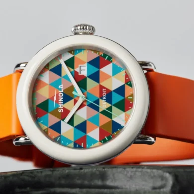 Shinola’s Detrola Art Dial brings the collection’s playful side forward with a bold geometric face and bright orange strap.